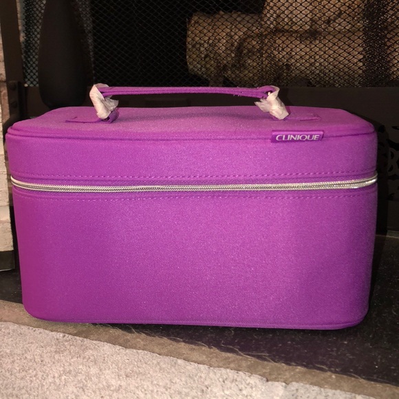 Clinique Handbags - Clinique purple makeup bag NIB!!